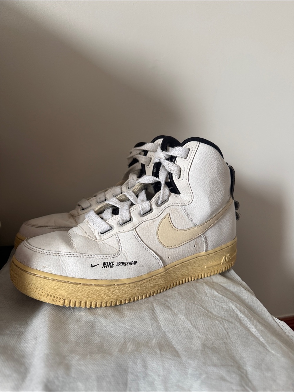 Nike White High-Top Air Force with Cream Swoosh and Yellowed Sole sz 9 women’s